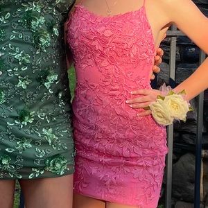 A Sherri Hill homecoming dress. Size 00. A beautiful bright pink color.